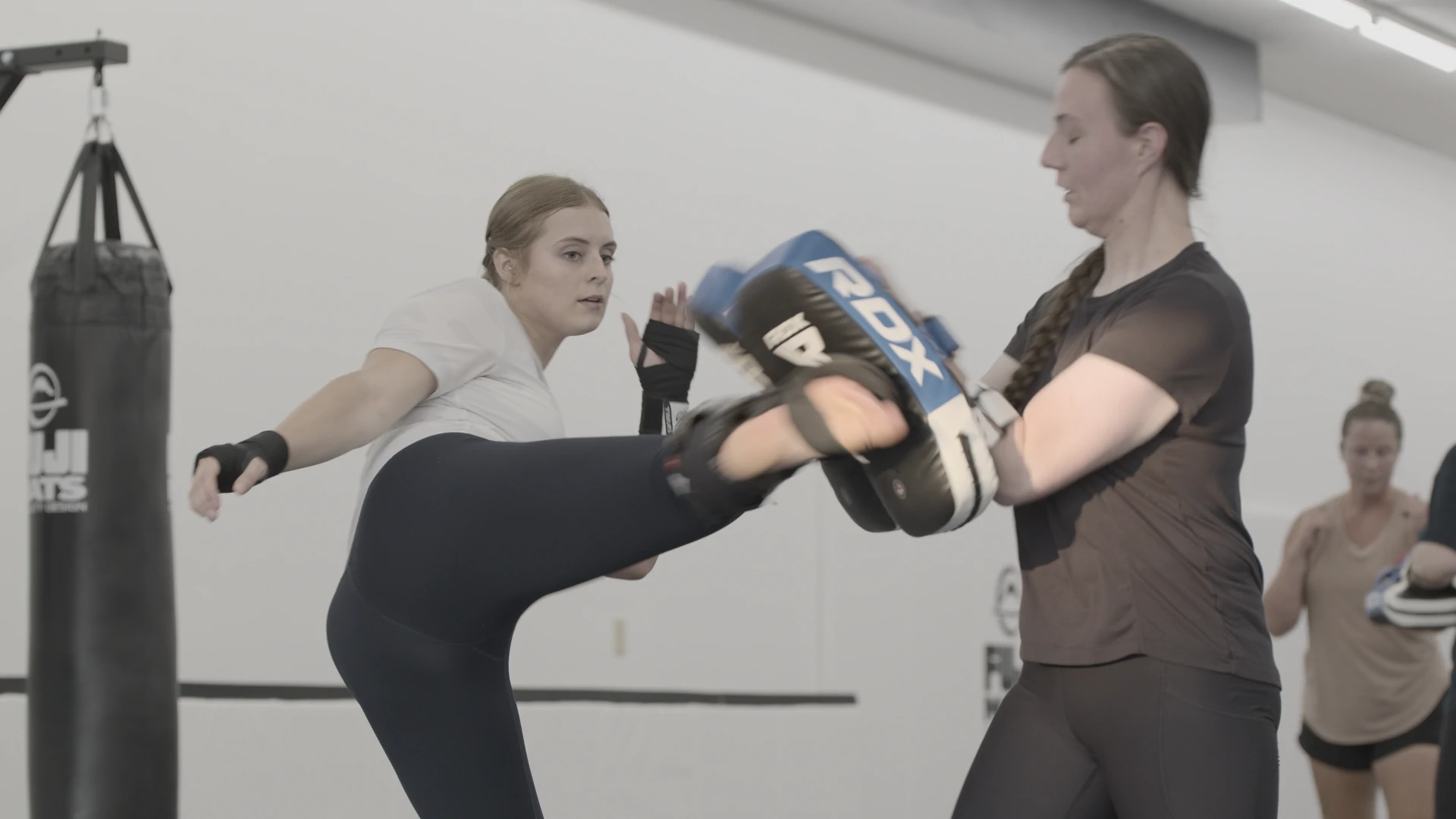 People practicing Kickboxing